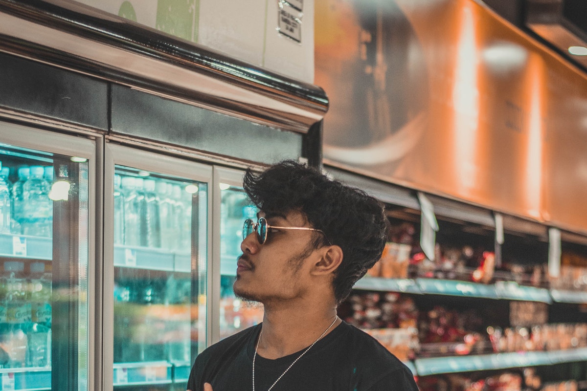 Stylish man in black shirt and sunglasses